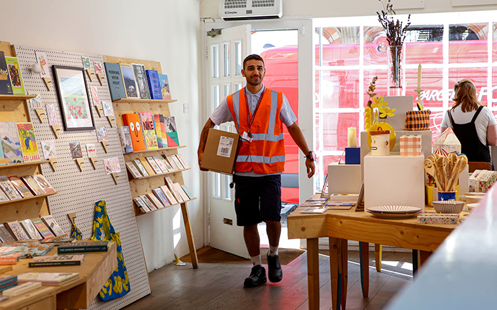 Postie in a shop